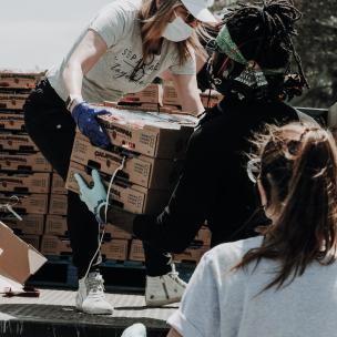 Woman distributes donations